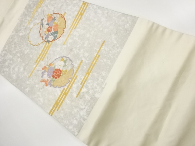 雪輪に草花・紗綾形・ヱ霞模様織出し名古屋帯